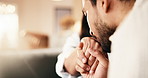 Holding hands, kiss and couple in home with love, bonding or connection in marriage together. Happy, support and man with woman for affection moment in relationship for trust or commitment in house.