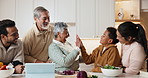 Cooking, family and kid high five with grandmother for learning recipe or tutorial in kitchen. Happy generations, child or meal prep success for guide with tablet, laugh or talk with parents in home