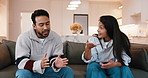 Couple, fight and disagreement with conflict on sofa for home argument, confrontation or break up. Frustrated, man and woman with issue for separation, toxic relationship or cheating affair in house