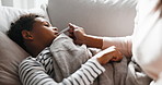 Sick, mom and kid in house with thermometer, childcare and health monitor with flu symptoms. Support, mother and child in home with tech, parenthood and temperature check in illness assessment.
