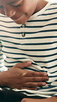 Tummy ache, sick and child in home with diarrhea, indigestion or symptoms for stomach allergies. Cramps, food poisoning and boy kid with belly discomfort, pain or abdominal illness in apartment.