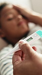Thermometer, sick and parent with child in bed for health, virus or infection in home for childcare. Family, checkup and hands of mom with boy in bedroom for temperature with cold, fever and flu