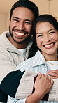 Face, hug and happy couple with love in home, support and partner loyalty with relationship security. Portrait, man and woman embrace for commitment at house together, smile and connection with trust