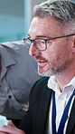 Discussion, feedback and businessman in office with advice on finance report with investment planning. Help, conversation and mature manager with financial advisor for budget review in workplace.