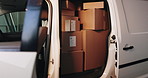 Distribution, delivery and cardboard boxes in empty van for inventory, export or cargo freight. Logistics, parcel and packages in vehicle for supply chain, stock or quality control with online order.