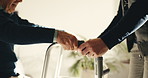 Caregiver, hands and old person with walker in home for support, assistance or physical therapy. Man, senior patient with a disability and frame in assisted living facility for physio and recovery