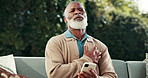 Senior, phone or black man with chest pain for heart attack,  cardiac arrest or hypertension. Elderly, male person or ache with smartphone on sofa for health risk, medical emergency or asthma in yard