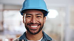 Happy, face and man in building with helmet for safety compliance, renovation and construction. Contractor, portrait and person for about us, confident and smile for remodeling at commercial property