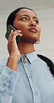 Phone call, talking and woman in building for evaluation, construction update and communication. Architecture, low angle and person on cellphone for conversation, contact and feedback for renovation
