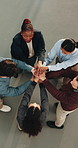 Hands, stack and above of business people in circle for solidarity, support and motivation. Office, applause and men with women in meeting for collaboration, agreement and partnership for goals