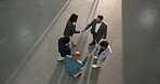Happy team, business people and handshake in meeting, talk or agreement for real estate opportunity. Above, space and shaking hands with realtor, colleagues and conversation for property investment