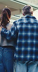 Couple, hug and ambition with new home for renovation, relocation or development together. Back view, man and woman with support or love for fresh start, beginning or safe shelter outside new house