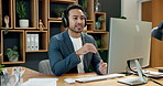 Headphones, online meeting and businessman with computer in office for planning finance project. Video call, waving and financial manager on virtual discussion for investment proposal in workplace.