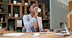 Office, computer and business woman with coffee for report, marketing campaign and advertising. Break, creative and African person with drink, latte and pc for internet, website review and project