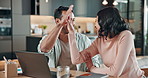 Couple, high five and laughing with laptop in house, freelance or happy for ebook publication on web. Remote work, writer and people with technology, celebration and publishing achievement in home
