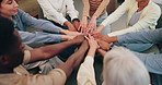 People, celebration and hands together in support group above for unity, help or social therapy. Top view, community or team piling with stack, applause or trust in huddle or circle for mission