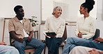 Therapist, talk and tablet in clinic with support group, wellness advice or smile for rehabilitation. Happy, counselor and people in therapy meeting with tech, conversation and tips for recovery.
