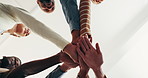 Below, people and hands together in office with celebration, clap and support for work collaboration. Happy, business team and huddle in agency with connection, group synergy or applause for success.