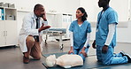 Dummy, cpr and doctor with students for teaching first aid, safety protocol and medical support. Healthcare, class and man with people in paramedic course for cardiac arrest, rescue or emergency care