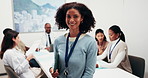 Hospital, face and woman in meeting with doctors, healthcare worker or admin for financial planning. Portrait, happy and person with pride for medical insurance, budget and finance advisor for clinic