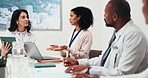 Healthcare, medical team or planning with laptop in meeting for case review, hospital budget or idea. Computer, doctors and people in discussion with tablet, clinic cost and care coordination notes