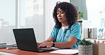 Woman, nurse and reading in office with laptop, research and email patient to schedule surgery. Nursing, person or typing in hospital with pc, medical report and telehealth for healthcare information