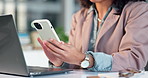 Phone, laptop and hands of businesswoman in office with email update on finance report planning. Typing, technology and financial advisor with cellphone for texting feedback on investment growth.