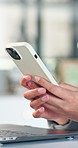 Woman, hands and typing in office with phone, social media marketing campaign and check notification. Bokeh, person and scroll in workplace with tech, post advertising project and brand management.