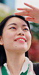 Student, thinking and smile with woman in park for campus search, reflection and travel explore. College tour, perspective and happy with person walking for location, journey and vision in Japan