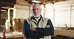 Carpentry, face and mature man in warehouse for woodworking, furniture and timber business. Contractor, portrait and person with crossed arms for manufacturing, lumber production or carpenter service