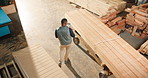 Dancing, man and carpenter with tablet in workshop with good news on artisan project order. Digital technology, fun and woodworker with groove for finished furniture manufacturing in factory.