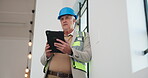 Construction, man and building inspection with tablet for code compliance, progress and reporting. Interior design, mature person and site visit with tech for quality control, renovation or low angle