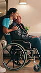 Happy, caregiver and support old man in wheelchair for home healthcare, compassion and wellness. Medical, carer and senior person with disability for recovery, comfort and talking in assisted living