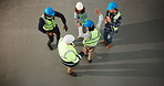 Above, people and dance on construction site for success, repairs or renovation with space. Building, teamwork and civil engineers for maintenance, remodeling or property development celebration
