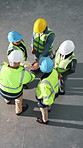 Above, applause and architect with hands together in warehouse for construction, motivation or success. People, team and contractors piling with celebration for winning, meeting or unity in depot