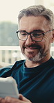 Mature, home or happy man with tablet for entertainment, online streaming or app subscription. Male person, user or smile with technology on sofa for network connection, research or fun game in house