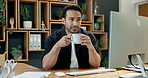 Businessman, drinking and computer with coffee in office for productive day or warm beverage. Man, employee or waiting for online response with caffeine, cup or mug for business email or feedback