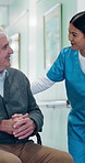 Wheelchair, nurse or old man in hospital for healthcare, talking or rehabilitation checkup. Medical worker, retirement and person with disability, smile or assistance for recovery support in hallway