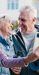 Laughing, old couple and selfie at park, fitness and forehead touch with partner or profile picture. Outdoor, health and senior people with yoga mat, photography and happy for memory on social media
