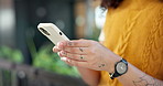 Typing, message and hands with phone in office, chat and communication with contact on social media. Business, internet search and person with mobile, texting and network with technology and online