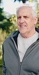 Walking, fitness and senior man outdoor for exercise, wellness and active in morning on weekend. Happy, nature and elderly person in retirement with cardio workout, health or warm up in park.