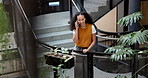 Steps, woman and phone call in office, talking or update for sustainability report at ESG startup. Happy person, mobile or conversation at stairs in business, eco friendly chat or communication above