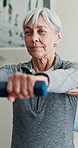 Smile, old woman and dumbbell exercise for physio, mobility improvement or functional screening. Clinic, worker and senior with weights for physical therapy, fitness assistance and strength training
