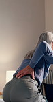 Home, injury and senior woman with back pain, osteoporosis or joint inflammation at bedroom. Retirement, arthritis and person with sore spine, rheumatism ache and fibromyalgia with medical discomfort