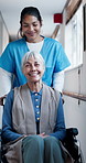 Wheelchair, nurse or push old woman in hospital for healthcare, talk or recovery help. Medical worker, retirement and person with disability, smile or assistance for rehabilitation support in hallway