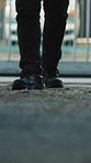 Legs, walking and person at construction site for inspection, development or protection boots. Safety shoes, builder and worker with quality control, compliance assessment and team on building floor
