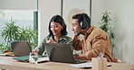 Headphones, laptop and business people in office with feedback on finance report online. Technology, coworking and financial manager with advisor on computer for review on investment plan with music.
