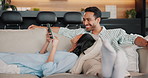 Happy, tv and couple on sofa with phone, internet and option on ecommerce website on weekend. Marriage, home and man with woman on tech for connection, bonding and watching movie together for love