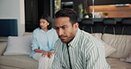 Couple, ignore and man on sofa in argument with relationship issue, conflict and no communication. Marriage, home and person with woman with disagreement, discussion and frustrated for separation