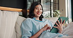Face, woman and relax on sofa with tablet, streaming and watching trailer of new movie releases. Portrait, person and smile in home with digital, upcoming film and internet search for trending video